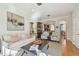 Inviting living room with comfortable seating, hardwood floors, and an open layout at 6030 Printery St # 108, Tampa, FL 33616