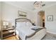 Well-lit main bedroom featuring a chandelier and neutral decor at 6030 Printery St # 108, Tampa, FL 33616