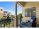 Balcony with furniture and views of the lake and community at 6411 Mayra Shores Ln, Apollo Beach, FL 33572
