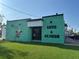Novelty coffee shop with outdoor seating and turf at 6411 Mayra Shores Ln, Apollo Beach, FL 33572