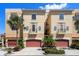 Charming villa-style residences, boasting private garages and lush landscaping, creating curb appeal at 6411 Mayra Shores Ln, Apollo Beach, FL 33572