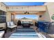 Inviting patio featuring comfortable seating and a cozy fire pit, ideal for intimate outdoor gatherings at 6411 Mayra Shores Ln, Apollo Beach, FL 33572