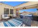 Relaxing patio with stylish seating and a dining area, perfect for enjoying the beautiful outdoor weather at 6411 Mayra Shores Ln, Apollo Beach, FL 33572