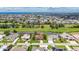 Breathtaking aerial view of a golf course community with waterfront properties and lush greenery at 811 Eagle Ln, Apollo Beach, FL 33572