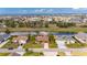 Expansive aerial view showcasing a house with a pool, close to waterways at 811 Eagle Ln, Apollo Beach, FL 33572
