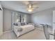 Bright bedroom with bed near window at 811 Eagle Ln, Apollo Beach, FL 33572