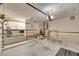 Spacious garage with laundry area, offering utility and potential at 811 Eagle Ln, Apollo Beach, FL 33572