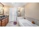 Bathroom with a shower and separate soaking tub at 1238 E Kennedy Blvd # 704, Tampa, FL 33602