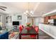 Bright dining room with modern lighting, hardwood floors and an open layout at 1238 E Kennedy Blvd # 704, Tampa, FL 33602