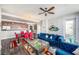Inviting living room featuring a plush blue couch, modern decor and hardwood flooring at 1238 E Kennedy Blvd # 704, Tampa, FL 33602