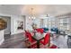 Bright living room featuring a large window, modern furnishings and gray hardwood floors at 1238 E Kennedy Blvd # 704, Tampa, FL 33602