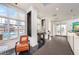 Lobby featuring a leather chair and pool views at 1238 E Kennedy Blvd # 704, Tampa, FL 33602