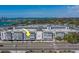 Aerial view showcasing waterfront building with picturesque surroundings at 131 Bluff View Dr # 208, Belleair Bluffs, FL 33770