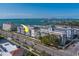 Beautiful aerial view of building and water at 131 Bluff View Dr # 208, Belleair Bluffs, FL 33770