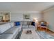 Comfortable living room area with stylish decor and natural light at 131 Bluff View Dr # 208, Belleair Bluffs, FL 33770