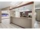 Well-equipped kitchen with stainless steel appliances and modern lighting fixtures at 13112 Groveland St, Spring Hill, FL 34609