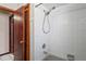 Close up of shower/tub with white tile surround at 13112 Groveland St, Spring Hill, FL 34609