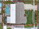 Aerial of the property highlighting the pool, patio, and well-maintained yard at 1350 Maple Sw St, Largo, FL 33770