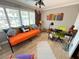 Bright office space with daybed, large windows, ceiling fan and unique artistic accents at 1350 Maple Sw St, Largo, FL 33770