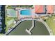 Aerial view features a pool, dock, and green space amenities, offering leisure and recreation at 19029 Us Highway 19 N # 30H, Clearwater, FL 33764