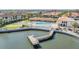 Stunning aerial view of a resort style community featuring a community pool and water access at 19029 Us Highway 19 N # 30H, Clearwater, FL 33764
