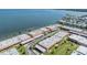 Scenic aerial view of the townhome community located near a tranquil body of water at 19029 Us Highway 19 N # 30H, Clearwater, FL 33764