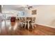 Dining room with an open layout featuring hardwood floors and a ceiling fan at 19029 Us Highway 19 N # 30H, Clearwater, FL 33764