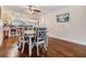 Cozy dining room with a modern ceiling fan and hardwood floors at 19029 Us Highway 19 N # 30H, Clearwater, FL 33764