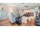 Bright living room with hardwood floors and neutral-colored furniture at 19029 Us Highway 19 N # 30H, Clearwater, FL 33764
