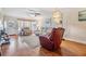 Bright living room with hardwood floors and comfortable seating at 19029 Us Highway 19 N # 30H, Clearwater, FL 33764