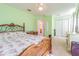 Bright bedroom featuring a cozy bed, closet, and well-lit access to the bathroom for added convenience at 20326 Merry Oak Ave, Tampa, FL 33647