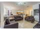Open-concept living room features tile flooring and seamlessly connects to the kitchen and dining areas at 20326 Merry Oak Ave, Tampa, FL 33647