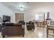 Comfortable living room featuring ample seating, plenty of natural light, and an open layout for easy entertaining at 20326 Merry Oak Ave, Tampa, FL 33647