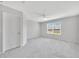 Bright bedroom with plush carpet, ceiling fan and window at 2109 Laceflower Dr, Brandon, FL 33510