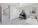 Cozy bedroom with a dedicated workspace, closet, and ample natural light at 2109 Laceflower Dr, Brandon, FL 33510