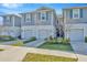 Row of modern townhomes boasting neat landscaping and an appealing facade at 2109 Laceflower Dr, Brandon, FL 33510