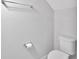 This bathroom features a standard toilet, towel bar, and toilet paper holder against a neutral wall at 2109 Laceflower Dr, Brandon, FL 33510
