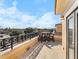 Outdoor balcony seating area with wrought iron railing and a view of the city at 2240 Soho Bay Ct, Tampa, FL 33606
