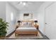 Clean bedroom with simple furnishings, calming decor, and natural light at 2240 Soho Bay Ct, Tampa, FL 33606