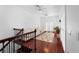 Bright living area with white walls, hardwood floors, and a comfortable white sectional couch at 2240 Soho Bay Ct, Tampa, FL 33606