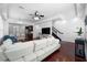 A view of an open floor plan with the living room flowing into the kitchen and dining area at 2240 Soho Bay Ct, Tampa, FL 33606