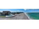 Beautiful waterfront home with a private pool and beach access, offering breathtaking ocean views at 2411 And 2407 Casey Key Rd, Nokomis, FL 34275