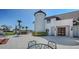 Exterior view of the house highlighting its architectural features, side patio and meticulous landscaping at 2411 And 2407 Casey Key Rd, Nokomis, FL 34275