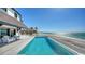 Luxury home with private pool overlooking the beach, blending upscale living with coastal charm at 2411 And 2407 Casey Key Rd, Nokomis, FL 34275