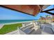 A beautiful patio with plenty of seating and ocean views to enjoy at 2411 And 2407 Casey Key Rd, Nokomis, FL 34275