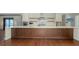 Spacious kitchen with large center island, modern appliances, and sleek cabinetry at 2411 And 2407 Casey Key Rd, Nokomis, FL 34275