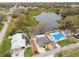 Aerial view of the property backing onto a tranquil lake at 2506 Mabry St, Tampa, FL 33618