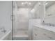 Bathroom featuring a large glass shower, vanity with marble countertop, and a clawfoot tub at 2921 W El Prado Blvd, Tampa, FL 33629