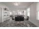 Dining area featuring modern table, comfortable seating, and bright lighting at 2921 W El Prado Blvd, Tampa, FL 33629