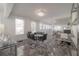 Bright dining room with modern table set, views to kitchen and office at 2921 W El Prado Blvd, Tampa, FL 33629